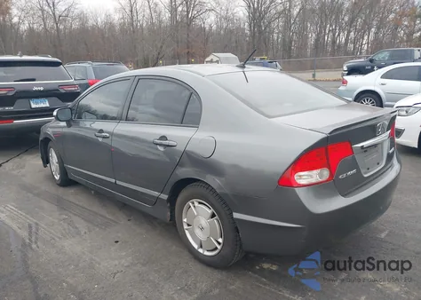 2010 Honda Civic Hybrid from USA, damaged, VIN JHMFA3F20AS007455